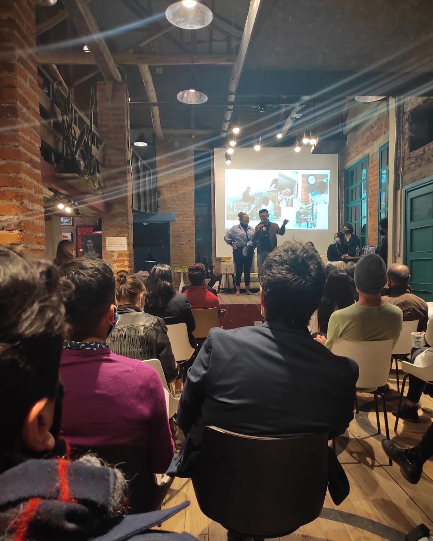 Meijun and Estefi from TakeThree Studio giving a Talk at IMPAQTO